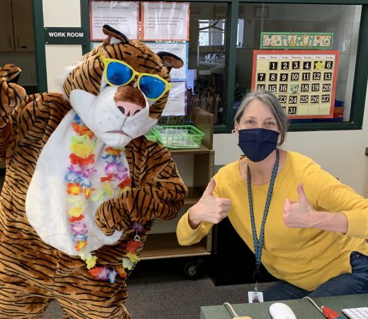 Cool Cat mascot and librarian