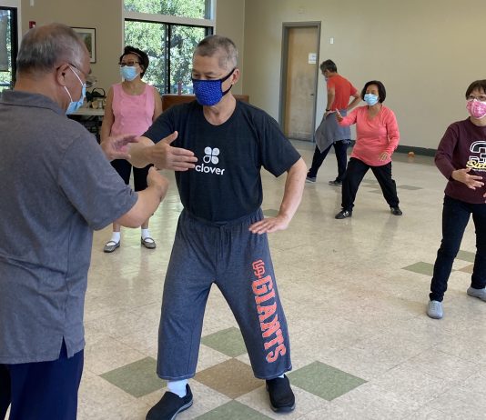 Senior nutrition center reopens for in-person lunches and activities seniors doing tai chi in Los Gatos