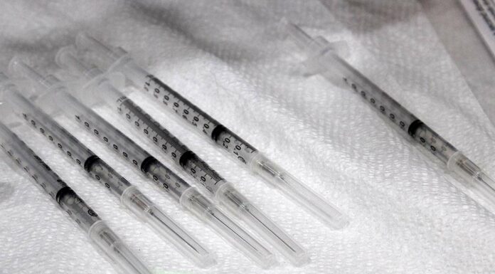 covid-19 vaccine syringe