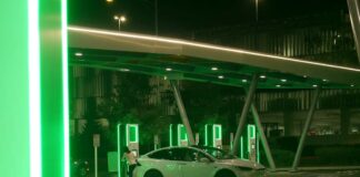 tesla charging electric vehicle