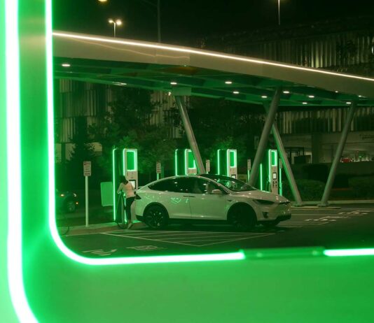 tesla charging electric vehicle