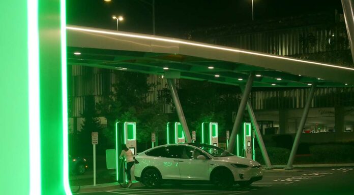 tesla charging electric vehicle