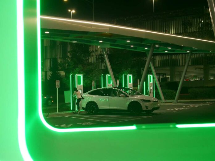 tesla charging electric vehicle