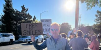 FREE THE SMILES sign