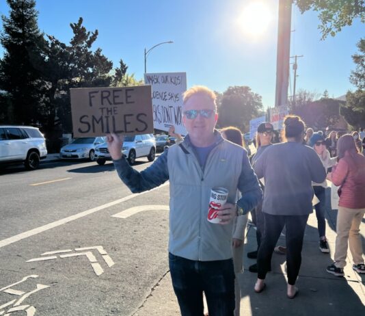 FREE THE SMILES sign