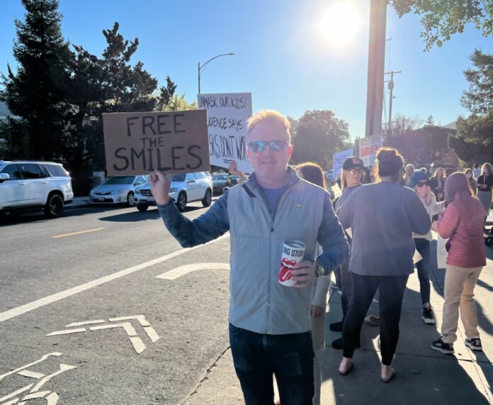 FREE THE SMILES sign
