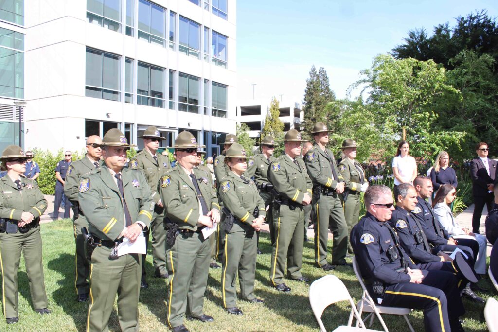 deputies stand in front of mental health facility