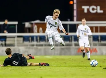 Kyle playing soccer