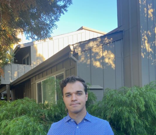 Rob Moore with flyer