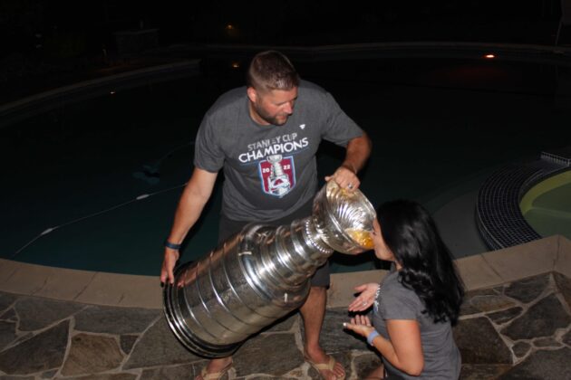 husband and wife with Stanley Cup