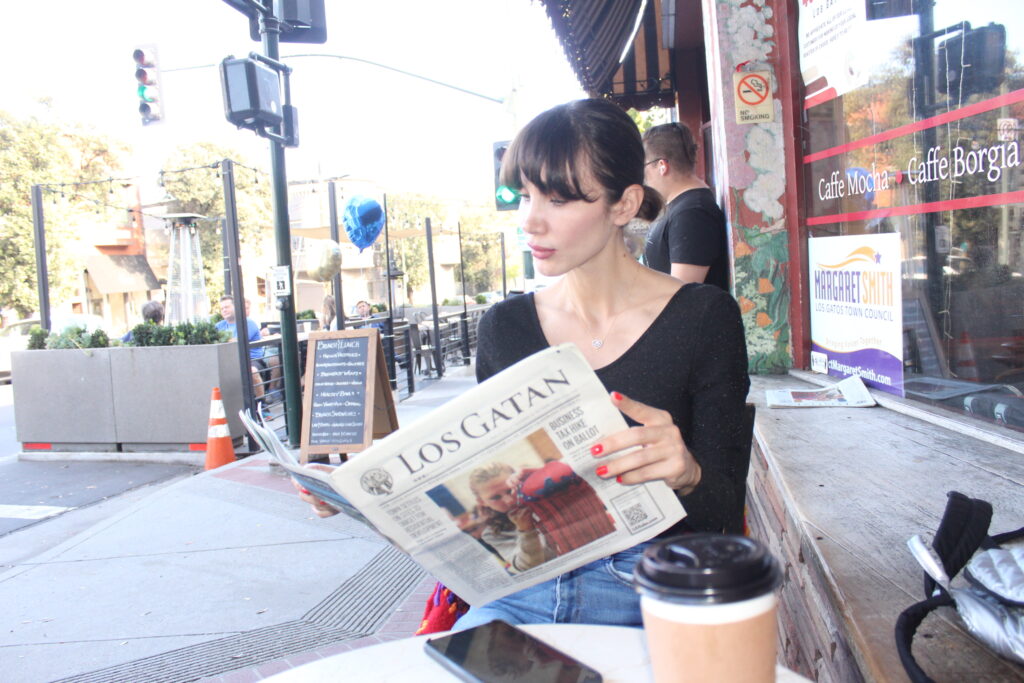 Yasemin reads the newspaper