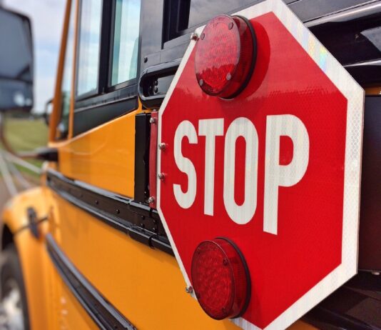 school bus and stop sign with lights