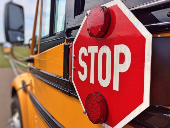 school bus and stop sign with lights