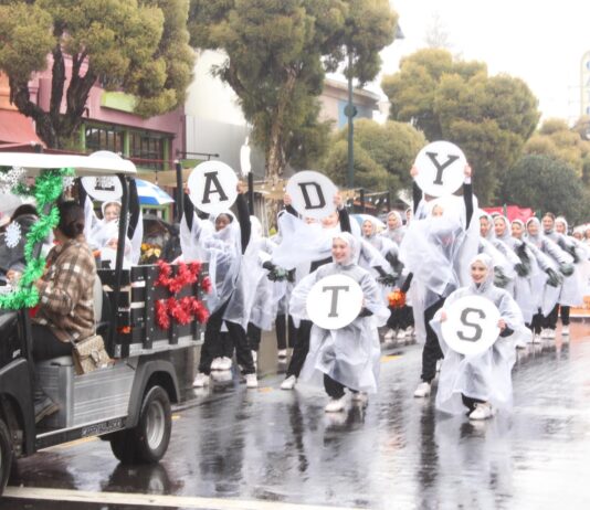 Holidays Parade drenched in rain, smiles and optimism (GALLERY) letters up