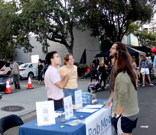 Kylie Clark booths with Rob Moore at Los Gatos Promenade event