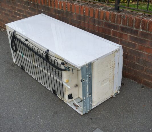 discarded fridge on the street