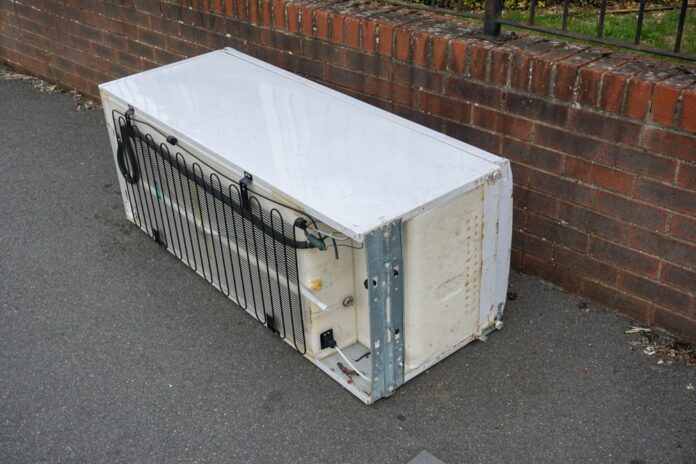 discarded fridge on the street