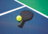 pickleball paddle and ball