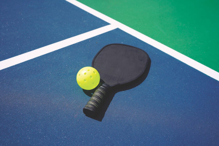 pickleball paddle and ball