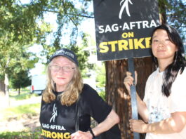 Kathryn Howell and Kim Jiang Dubaniewicz protest at the Netflix HQ