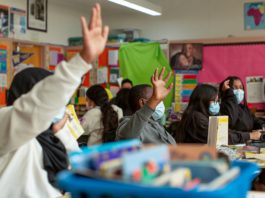 raising a hand in class