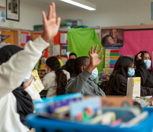 raising a hand in class