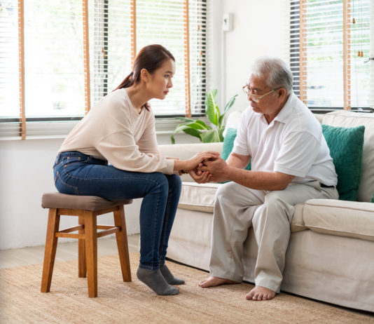 senior and caregiver