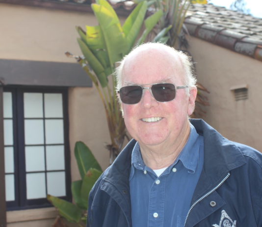 Wayne outside building