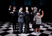The Addams Family cast in costume