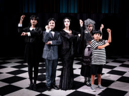 The Addams Family cast in costume
