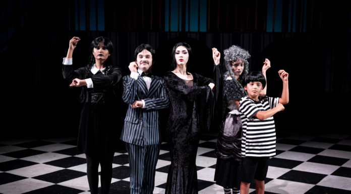 The Addams Family cast in costume