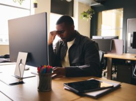 Black businessman stressed