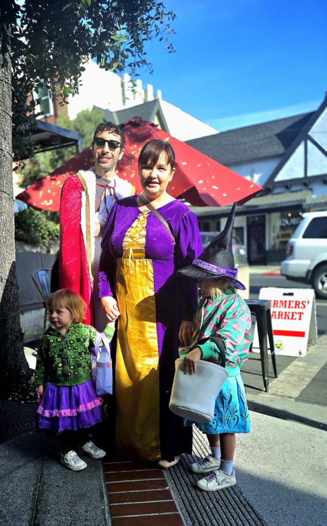 family dressed in Halloween outfits