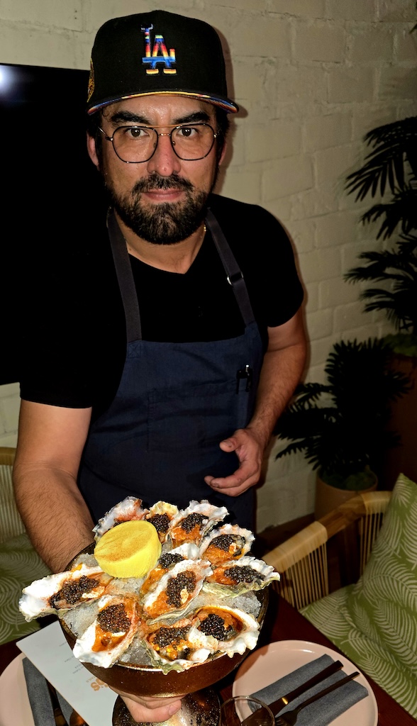 chef with oysters