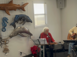 Robert seals and woman play music