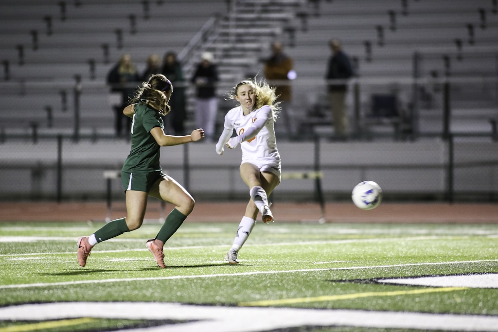 she kicks the ball