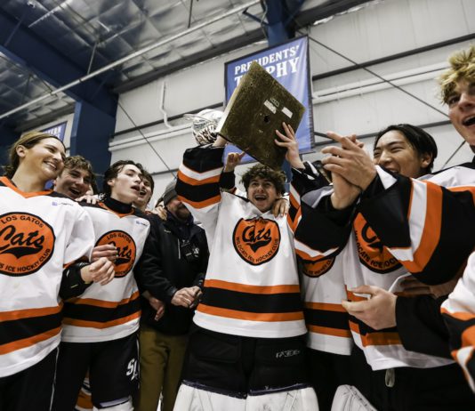 raising the trophy
