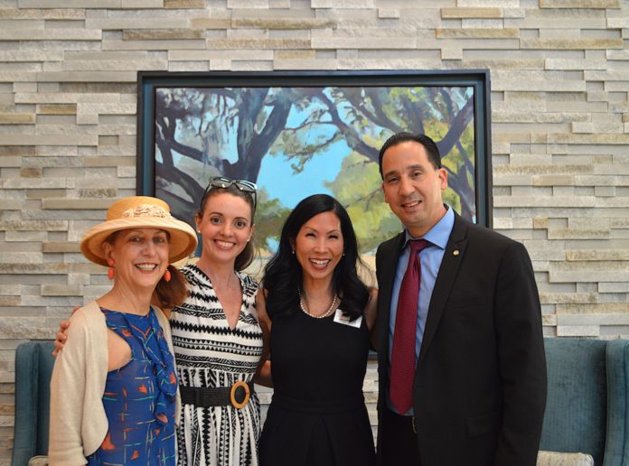 Group shot Tiffany Chris Jennifer etc at the senior living opening