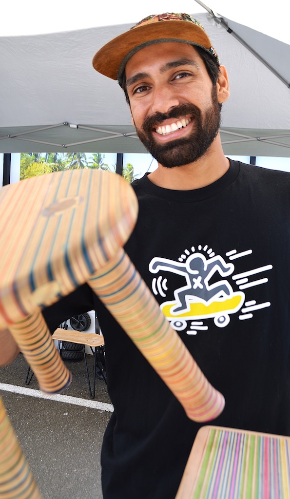 man with piece of handcrafted skate furniture