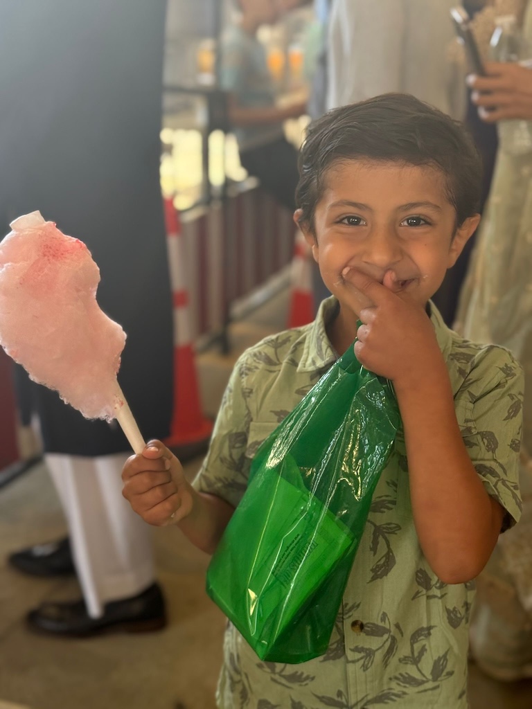 child with cotton candy