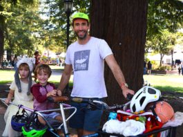 cyclist father with kids