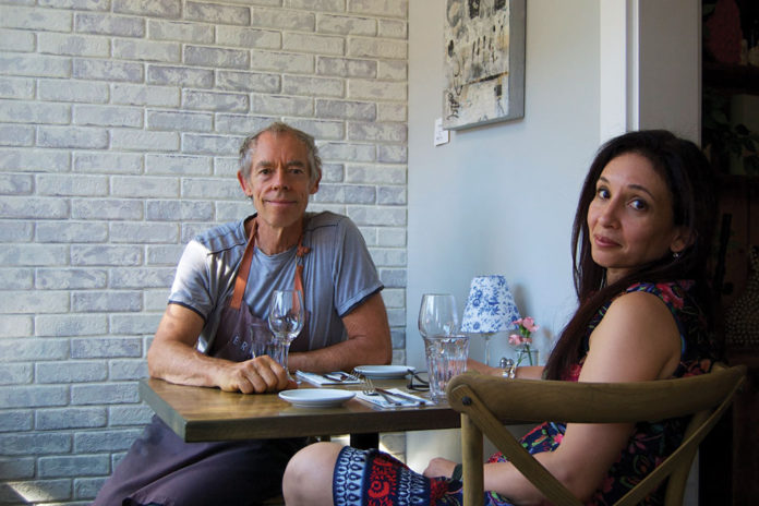 Man and woman sitting at a table