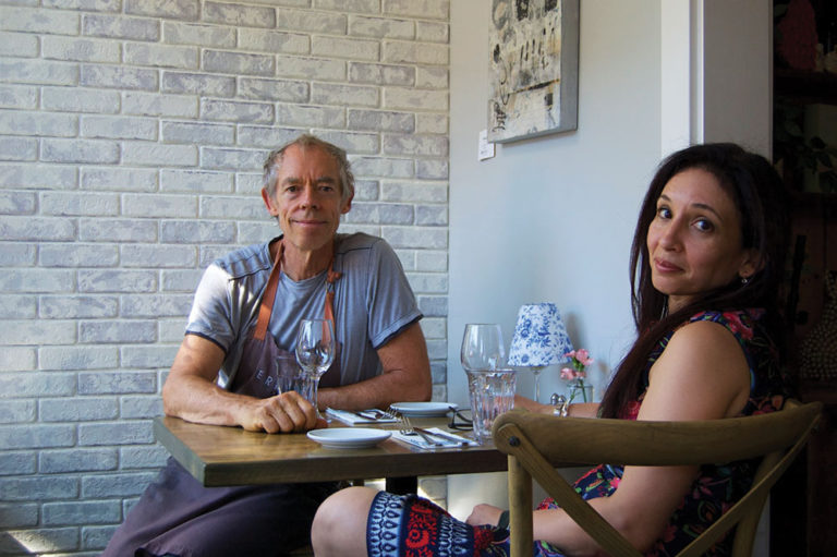 Man and woman sitting at a table
