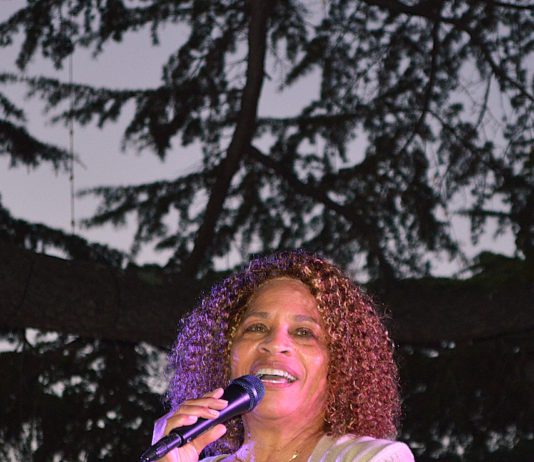 Clairdee sings under the redwoods in Los Gatos