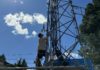 Daniel Roberts climbs a radio tower