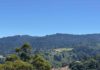 green hill blue sky