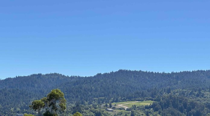 green hill blue sky