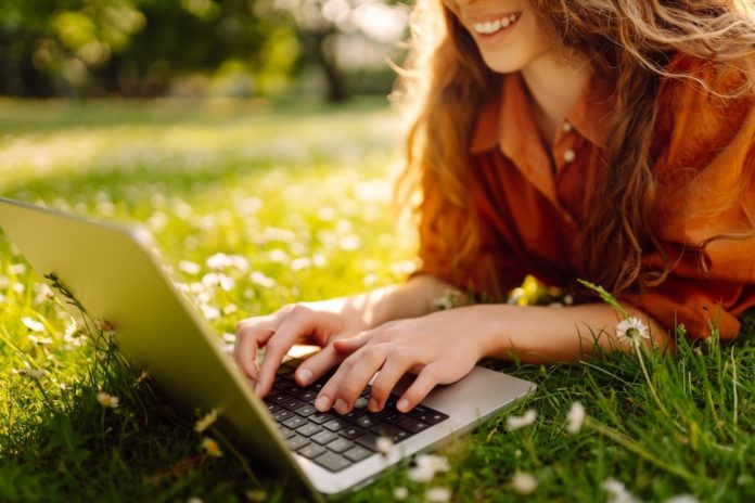 With Laptop