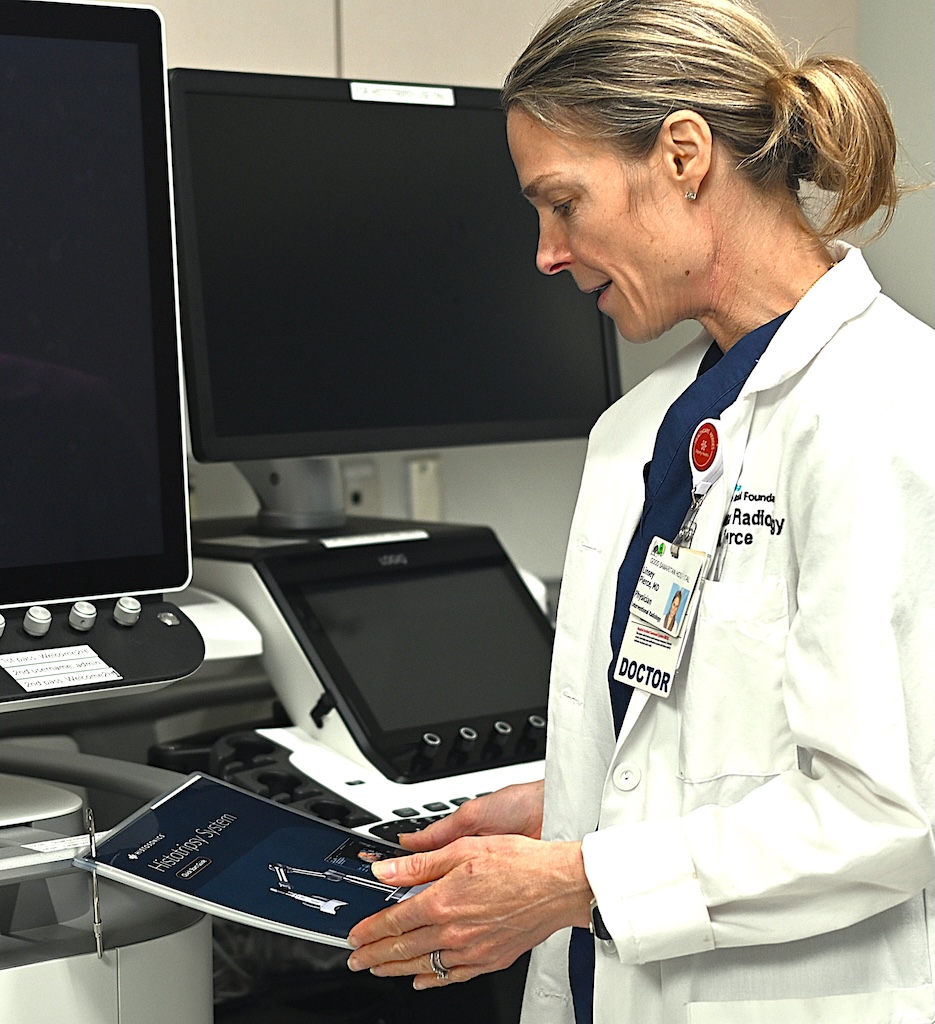 Dr. Lindsey Pierce with the machine