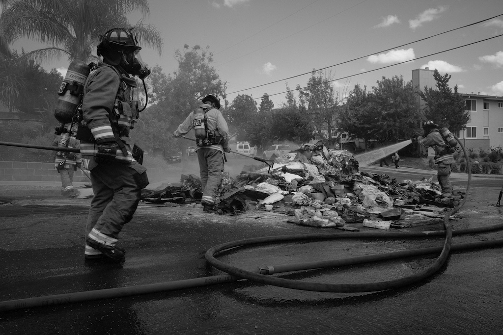firefighters in black and white